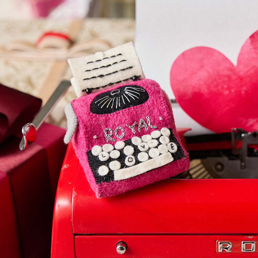 Ornement machine à écrire rose amour secret