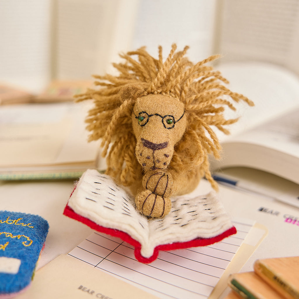 L'ornement lion de lecture