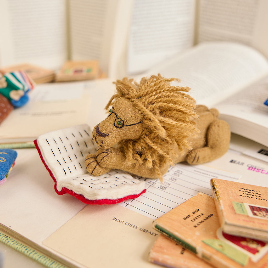 L'ornement lion de lecture