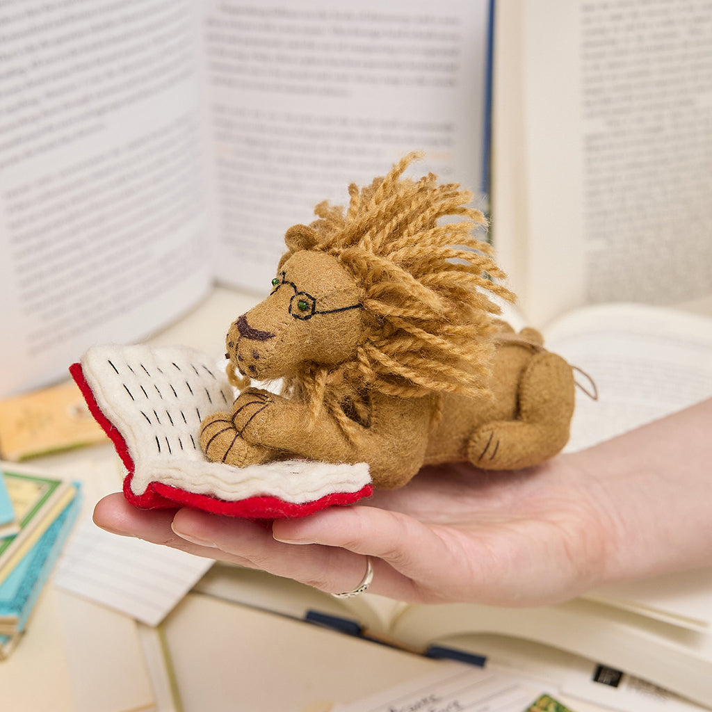 L'ornement lion de lecture
